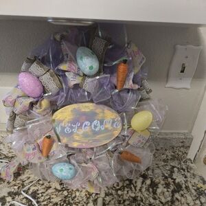 Handmaid easter wreath with welcome sign.